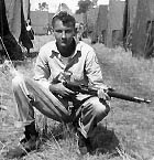 Bob Webber holding Arisaka Model 38 carbine, bolt open